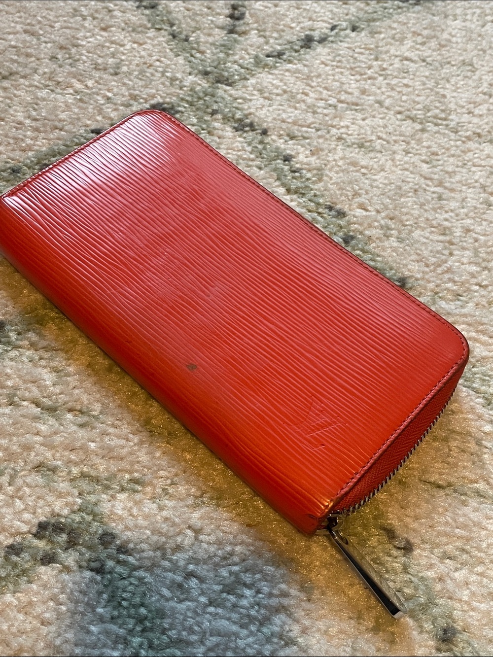 Louis Vuitton - Epi Leather Zippy wallet in orange